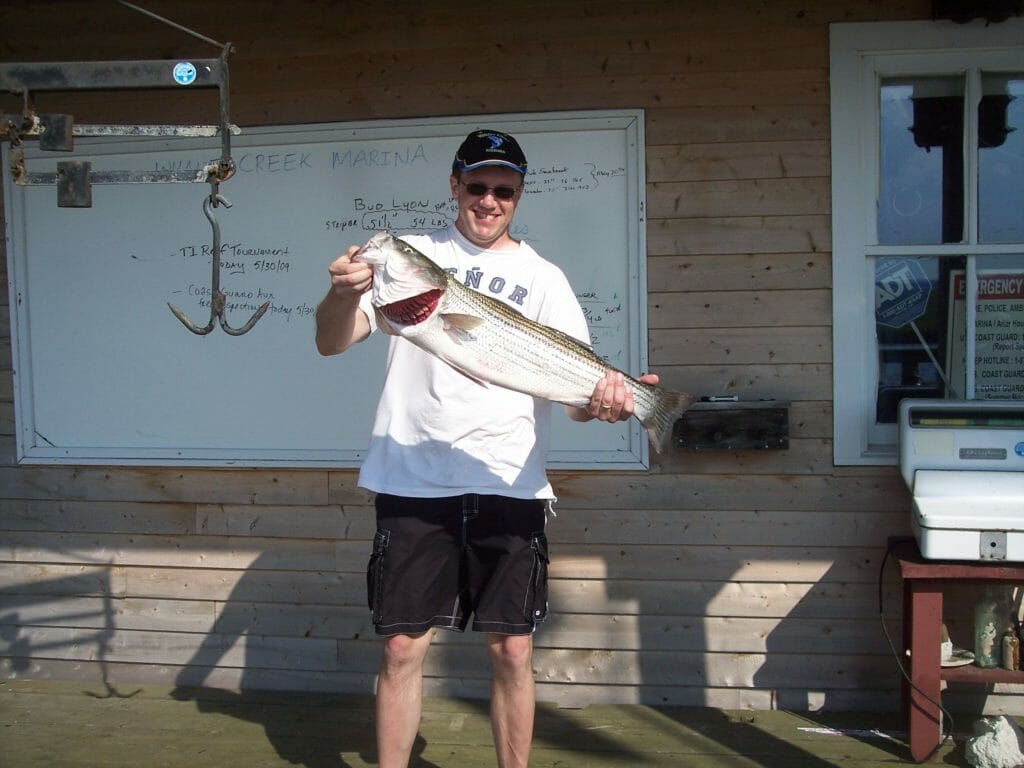 Visitors and their catch at Whale Creek Marina in 2010